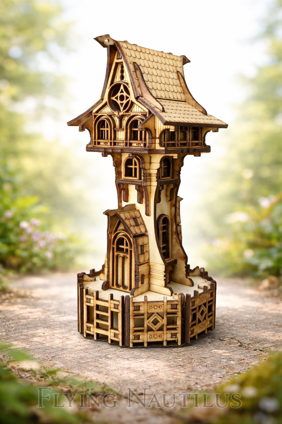 Handcrafted wood Dark Fairy Tower in a garden setting, created by Flying Nautilus